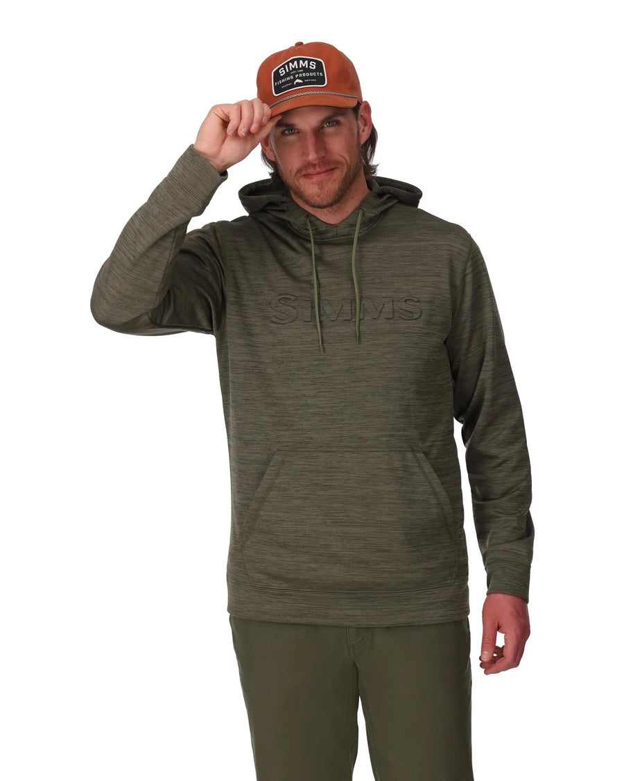 Man wearing a green hoodie and cap with a brand logo on a white background